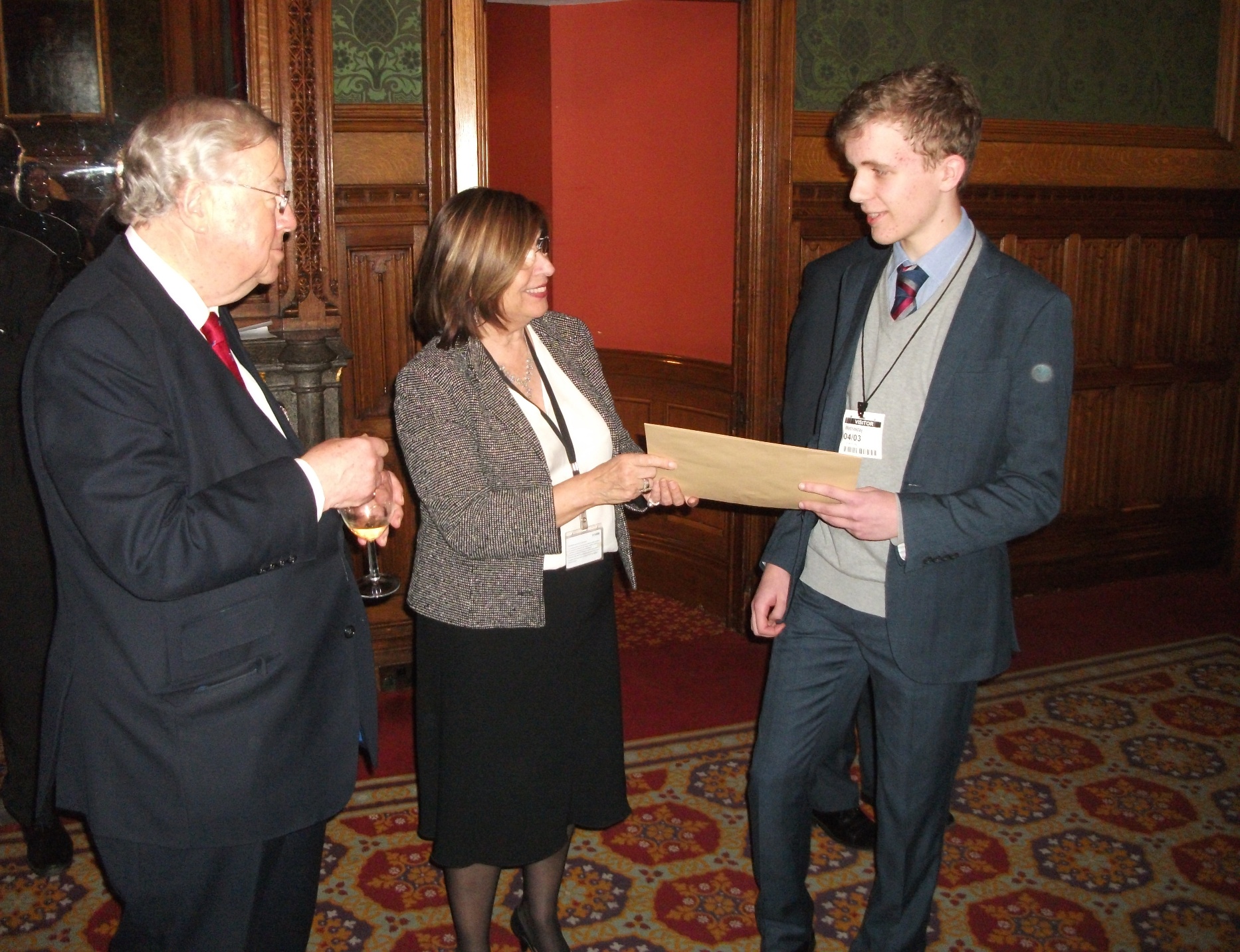 Alan receiving his prize from Baroness D'Souza, with Lord Cormack