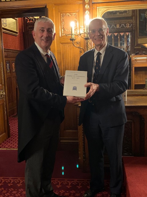 Photograph of Lord Norton and Sir Lindsay Hoyle presenting the History of Parliament House of Commons 1422-1461 book. 