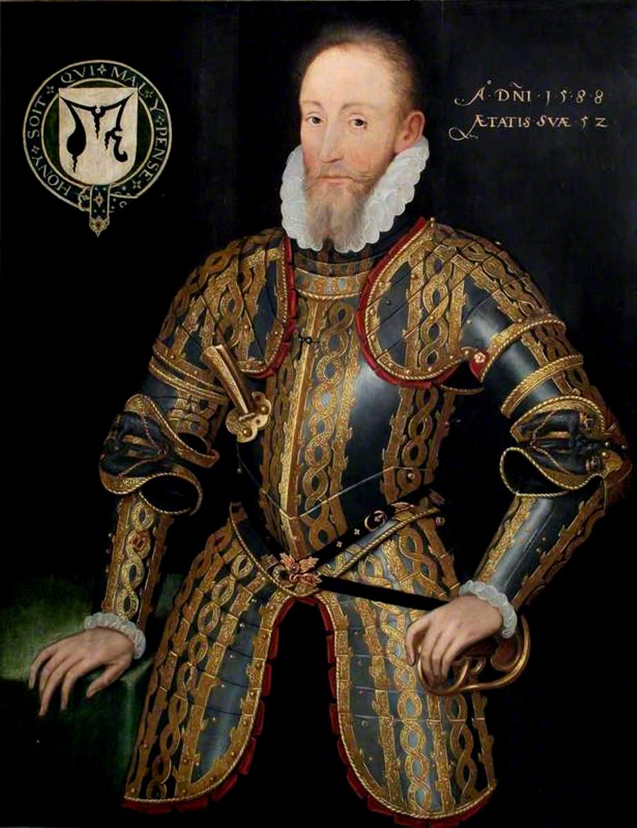 A portrait of a white man wearing decorated armour. It is black with a gold pattern. The background is plain black. His right hand is leaning on a table.