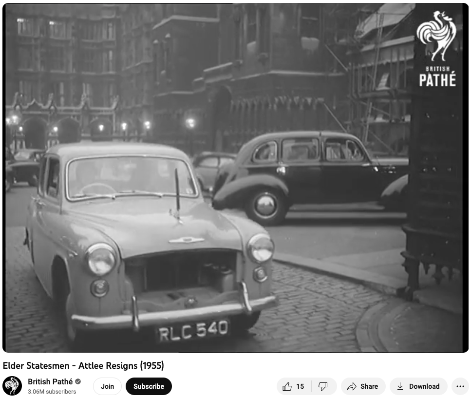 A screenshot of a British Pathe video on YouTube. There are multiple cars parked and one car leaving from the Palace of Westminster. The title of the YouTube video is 'Elder Statesmen - Attlee Resigns (1955)'.
