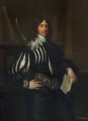 An oil painting of a white man with shoulder length brown hair and bangs, and a moustache. He is standing with his right hand on his hip and his left hand holding a piece of paper. His shirt has a large white collar and half of it is striped black and white. He is wearing an ornate belt and dark trousers.