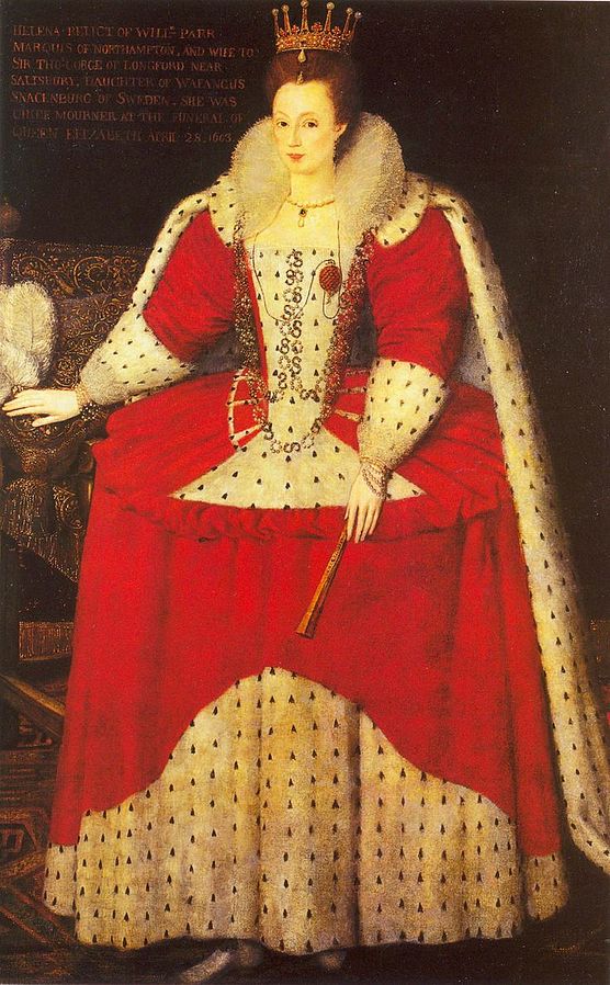 Helena in the robes worn at the coronation of James I and Anne of Denmark in July 1603. She is wearing a red dress with a wide hooped skirt, with a white bodice and caped back. She has a large ruff around the back of her head, with red hair on top of her head and a crown-like headpiece.