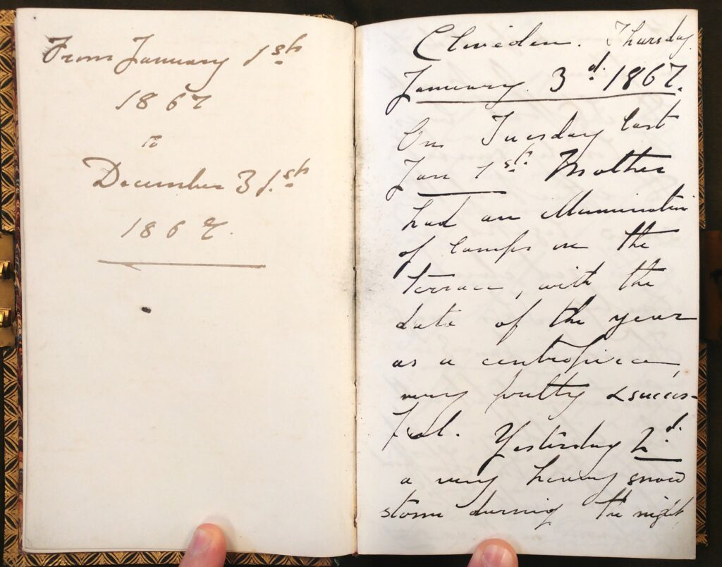 A photograph of Ronald Gower's diary on the first two pages. Handwritten, it reads on the first page 'from January 1st 1867 - December 31st 1867'. The second page is dated January 3rd 1867, followed by an entry in hard to decipher cursive. 