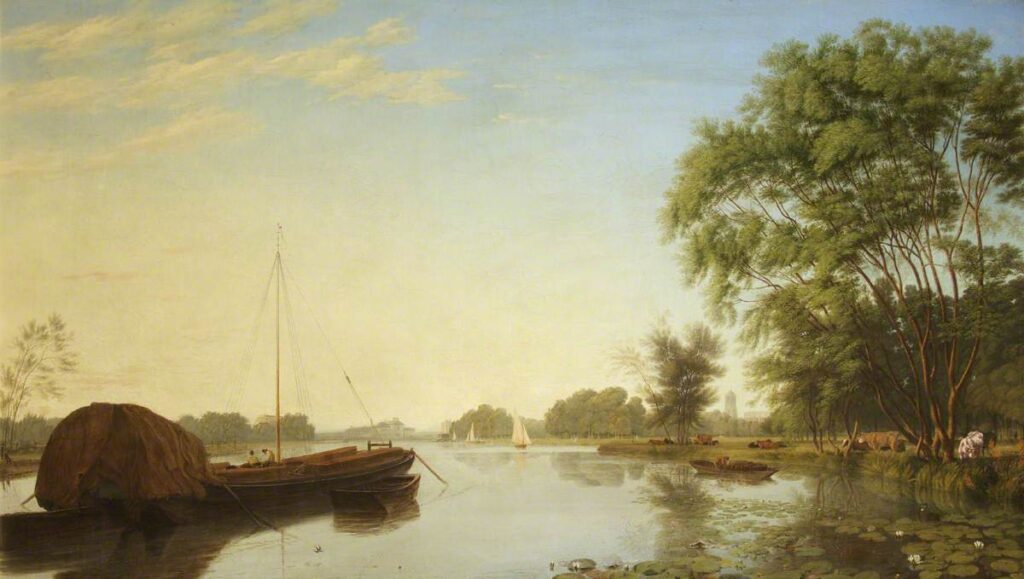 William Turner's painting depicts the river and surrounding landscape from a towpath in Oxford. The scene is of the river, clear and reflecting the blue sky above. There are multiple sailing boats in the distance with a large boat and two passengers in the foreground. On the right of the painting there is a large tree hanging over the river with cows grazing next to the tree in the fields. In the distance grand buildings of Oxford can be seen.