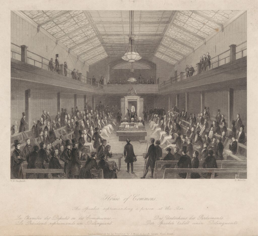 A line engraving titled 'House of Commons, the Speaker reprimanding a person at the bar'. In the foreground there is a walkway into the middle of the room, with two rows of benches either side. The middle of the room has a table with the despatch boxes on top. Behind the table stands the Speaker with his wig and robe. Either side of the room are four rows of benches, with a viewing gallery above. The room is full of MPs sitting on the benches and a few viewing from the gallery.
