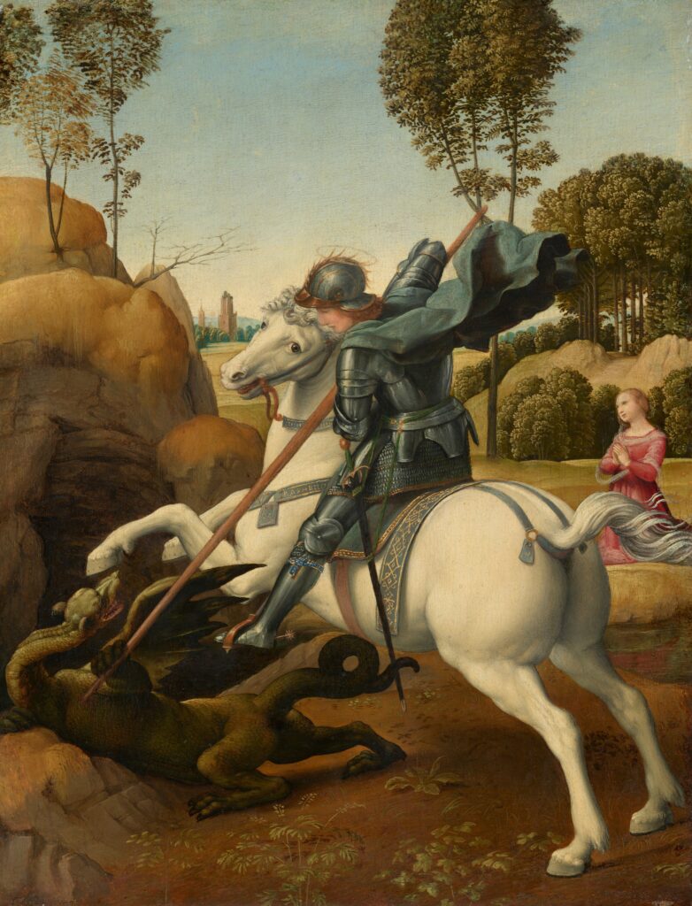 A vertical painting of a man wearing armor on a white horse, drives a long lance down at a lizard-like dragon as a woman kneels with her hands in prayer. The man is in full armour with a blue cape, and has a narrow blue and gold band tied around his calf with the word 'Honi'. He has a brown hair under his gold-trimmed, pewter-gray helmet. Both people have halos over their heads. The women is wearing a pink dress with a white wrap around her shoulders. In the background, there is an entrance to the cave next to the knight and the dragon, and behind the women are some tall trees and shrubs. In the far background you can see the tower of a castle. 